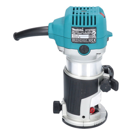 Makita RT 0702 C One-handed router 710 watts 6 / 8 mm